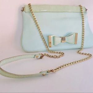 Lulu Guinness mint-tea leather hinge opening, gold chain bow-tied crossbody bag